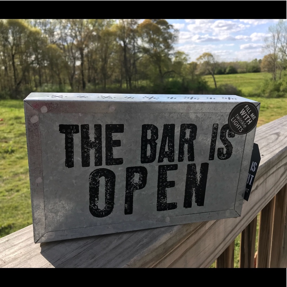 “Bar is open” tin sign. Hobby Lobby.